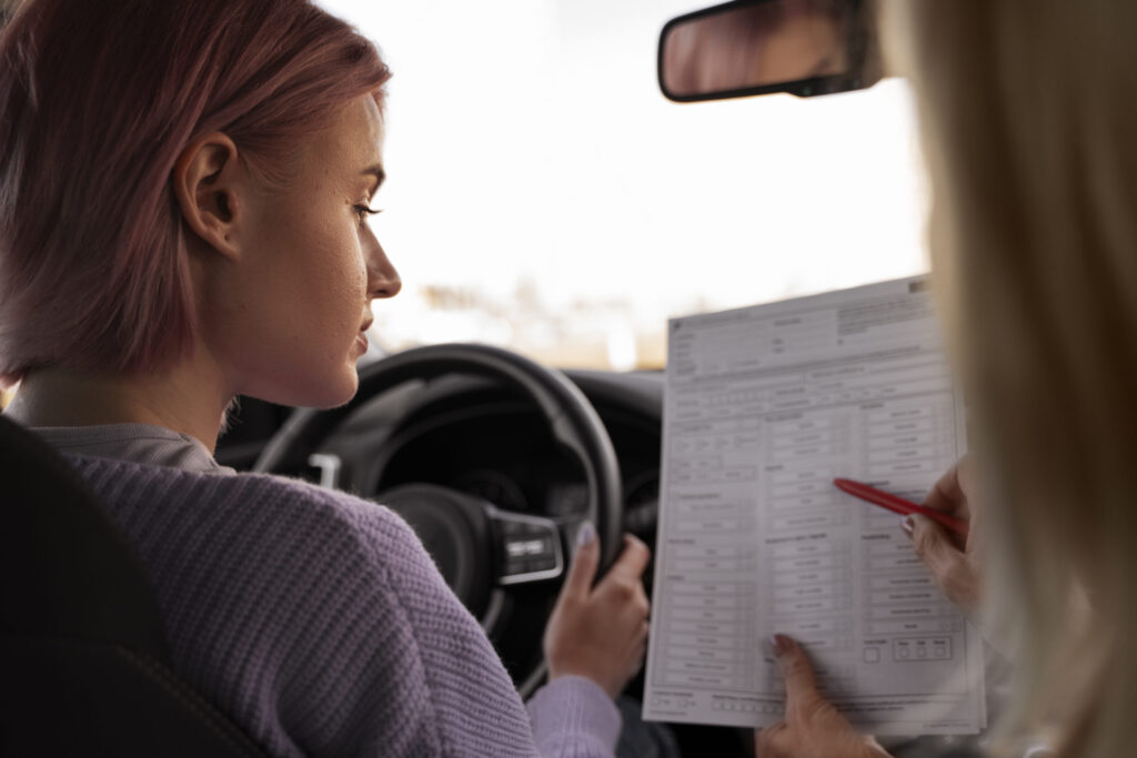 woman taking her drivers license test vehicle